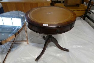 Mahogany effect drum type coffee table on single pedestal 3 star base with tan leather surface and