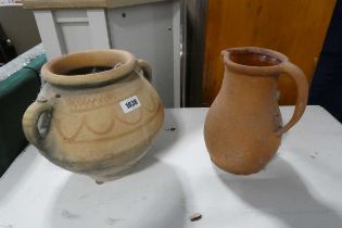 Single handled terracotta jug with twin handled similar jar