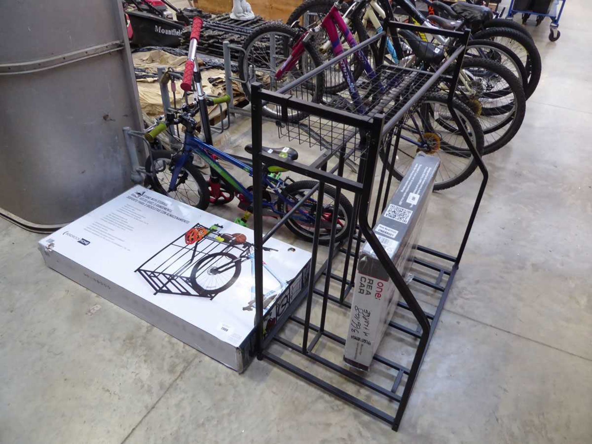 +VAT Boxed 3 sectioned bike stand with storage basket above