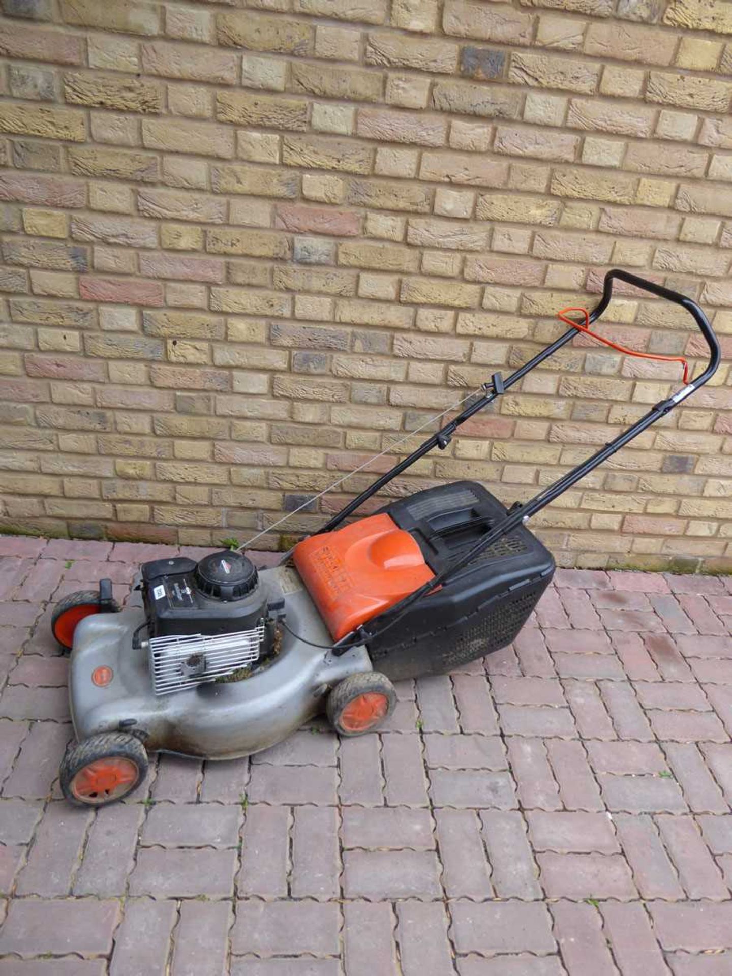 Flymo hand propelled petrol lawnmower