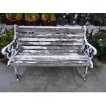 Weather wooden slatted metal ended garden bench