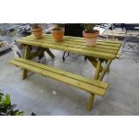 Wooden slatted picnic bench