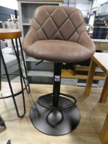 Brown leatherette upholstered bar height on black metal support