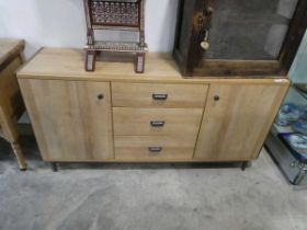 Modern hardwood effect sideboard with 3 central drawers and 2 cupboards in a 2 tone finish