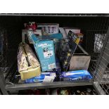 +VAT Cage containing various personal care items including Gillette Mach 3 razors, Wilkson Sword