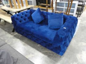 +VAT Blue velvet button back upholstered 2 seater sofa on slender chrome supports