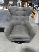 Grey leatherette upholstered modern easy chair on a swivel black base