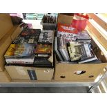 2 cardboard boxes of various DVD's together with 5 further smaller boxes of DVD's