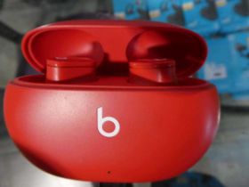 +VAT Pair of Beats earbuds in red