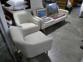 Cream fleece upholstered 3 seater sofa on beech tapered supports, together with a similar easy chair