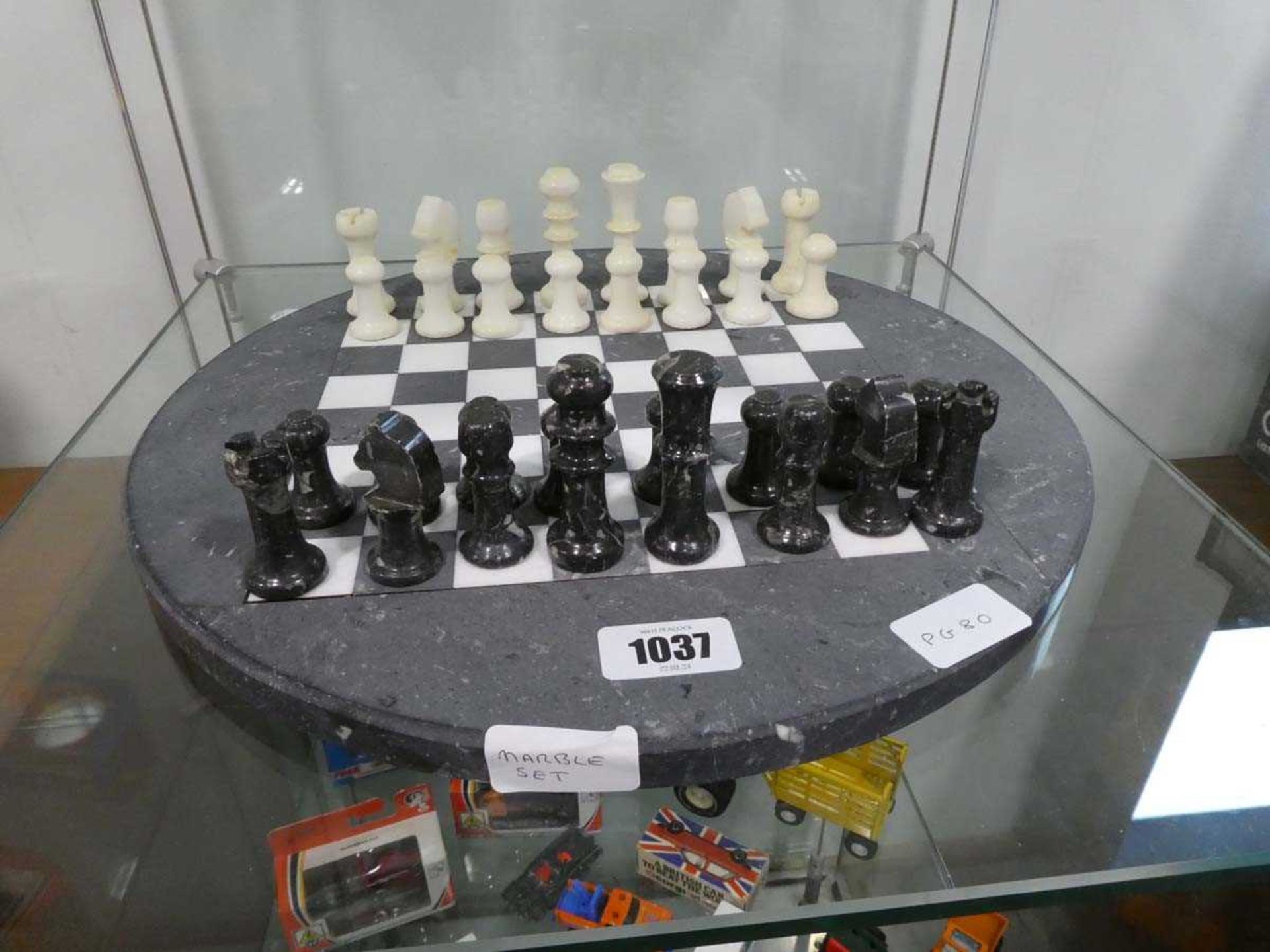 Circular marble finish chess set