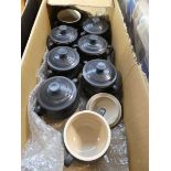 Box containing collection of Le Creuset pots