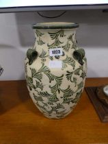 Green and beige floral pattern vase