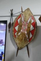 African animal hide shield and wooden spear set, tribal art