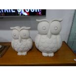 Graduated pair of white ceramic owls