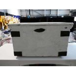 White painted trunk with black metal handles