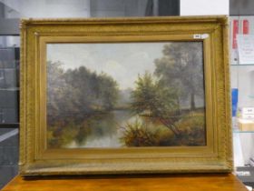 Large gilt framed painting of a river scene