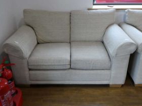 Modern pair of natural coloured upholstered sofas, including a 2 seater and a 3 seater