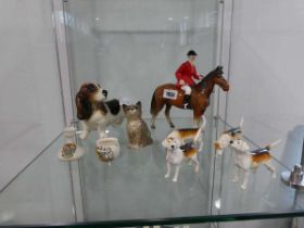Quantity of various ornaments including Beswick hounds, horse and rider, Beswick cat, 2 pieces of