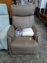 Brown leatherette upholstered electrically reclining easy chair with custom fleece cover