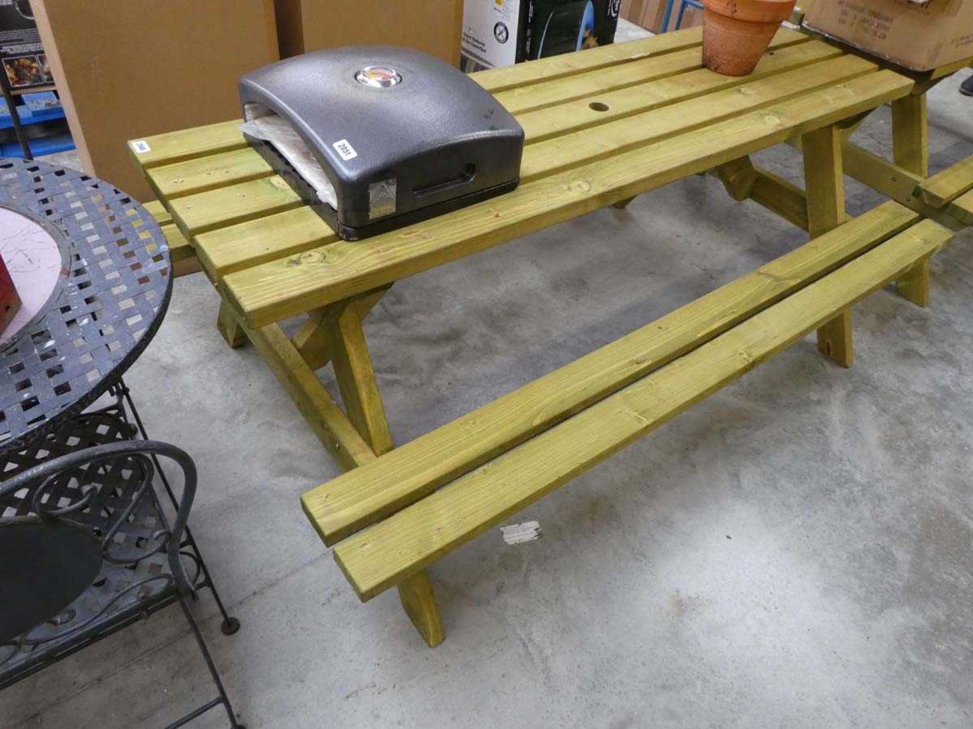 Wooden slatted picnic bench