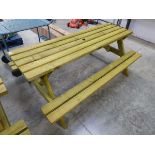 Wooden slatted picnic bench