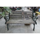 Metal ended and wooden slated garden bench