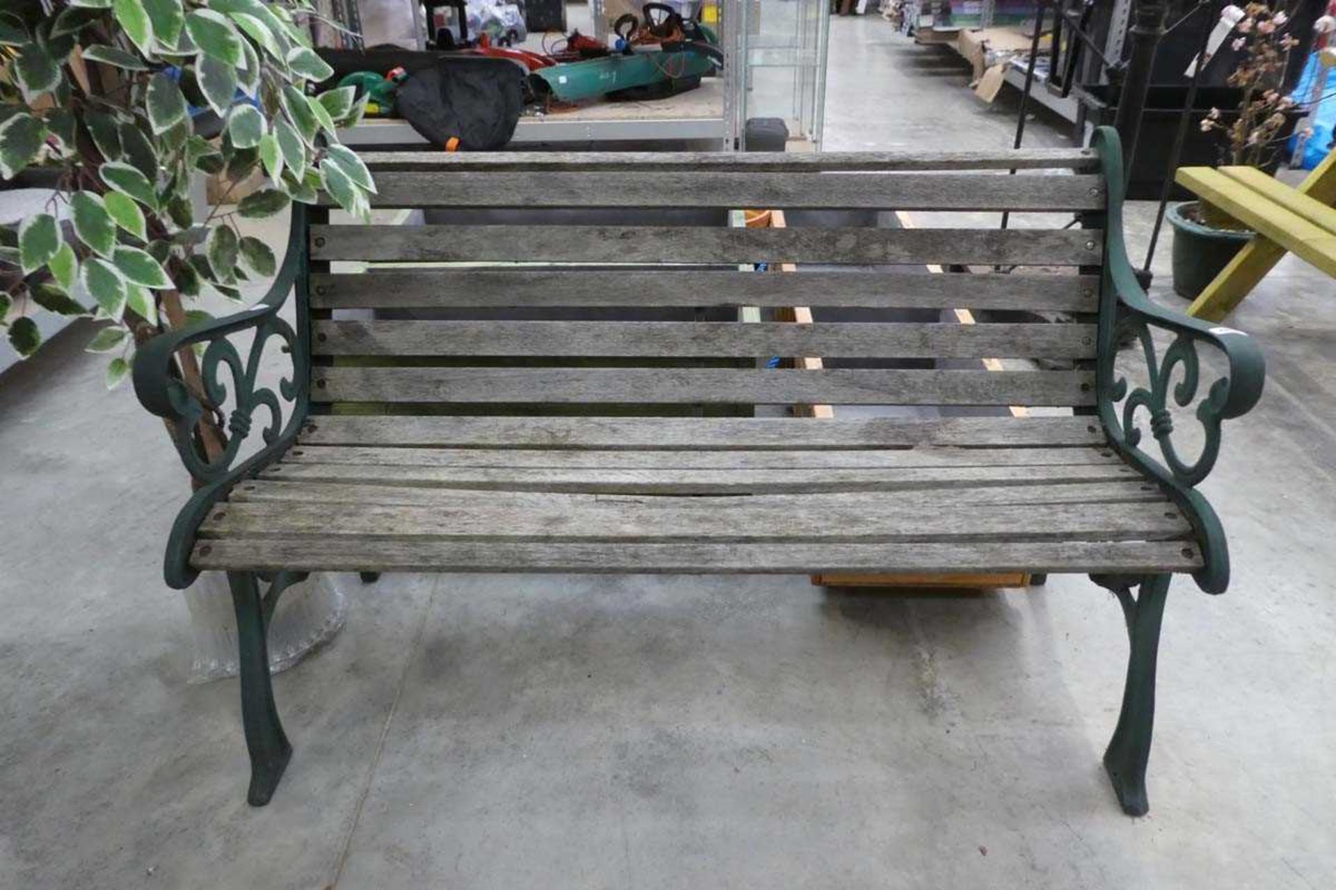 Metal ended and wooden slated garden bench