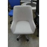 Light grey cloth swivel office armchair on 5 star base