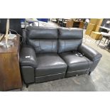 +VAT Dark grey leatherette upholstered 2 seater sofa with electric reclininng