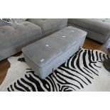 Modern grey upholstered storage ottoman