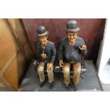 Laurel and Hardy ornament; the 2 comedians sat on a metal bench