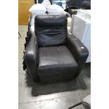 Brown leather upholstered easy chair with electric powered reclining