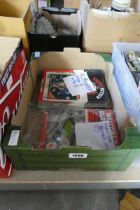 Box containing various Manchester United programmes from 1970s, 1980s & 1990s