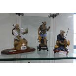 3 ceramic ornaments of Japanese fisherman on wooden stands