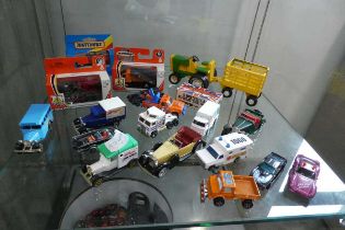 Shelf of Matchbox Corgi and other Diecast vehicles