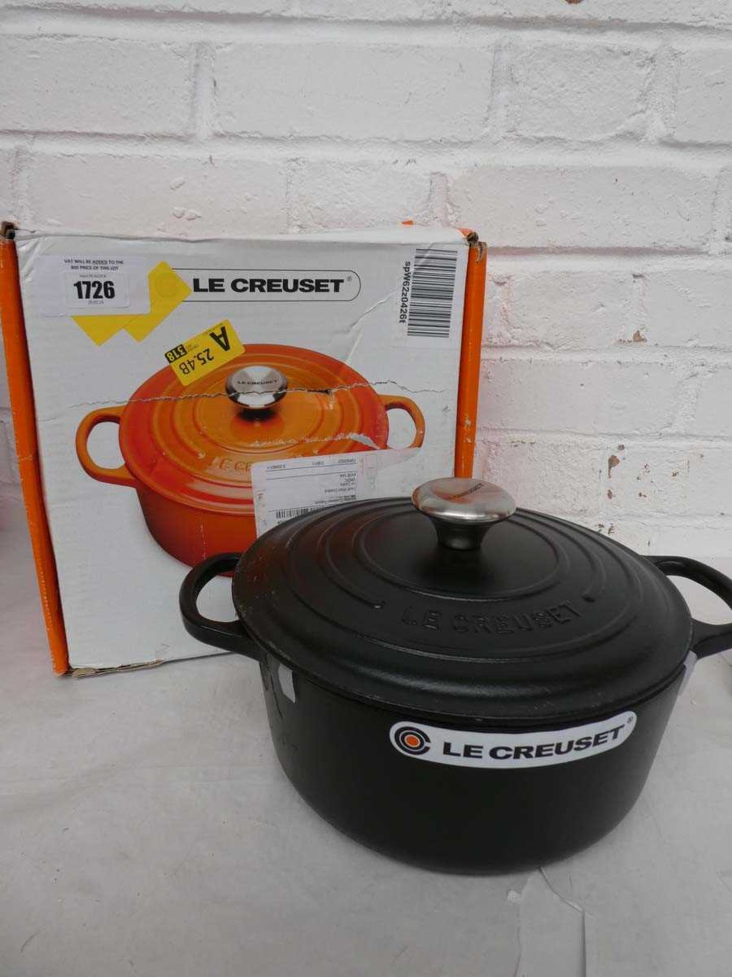 +VAT Le Creuset enamelled cast iron signature round casserole dish with lid in black, 4.2L Damage to