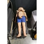 Quantity of various CPR dolls and associated accessories over 9 cases incl. extra clothing, etc.