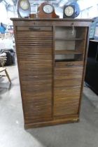 Midcentury tambour fronted storage unit with adjustable shelving