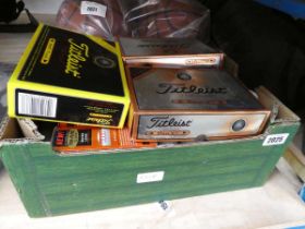 Box containing a quantity of mixed branded golf balls