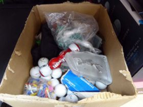 Box containing a quantity of mix branded golf balls and other items