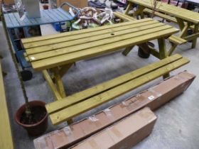 Wooden slatted picnic bench