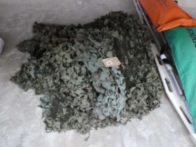 A large bundle of camouflage netting