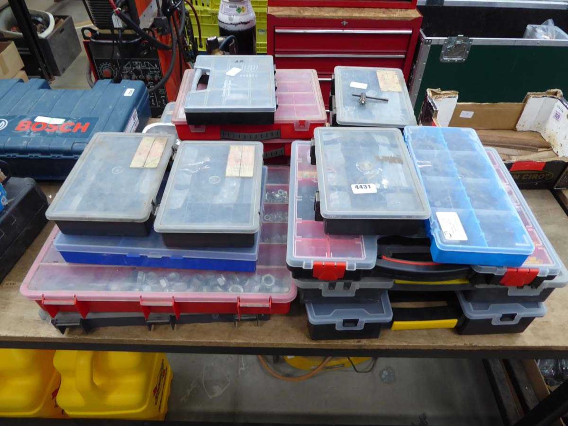 Large quantity of plastic fixings boxes inc. nuts, bolts, screws, washers, electrical connectors