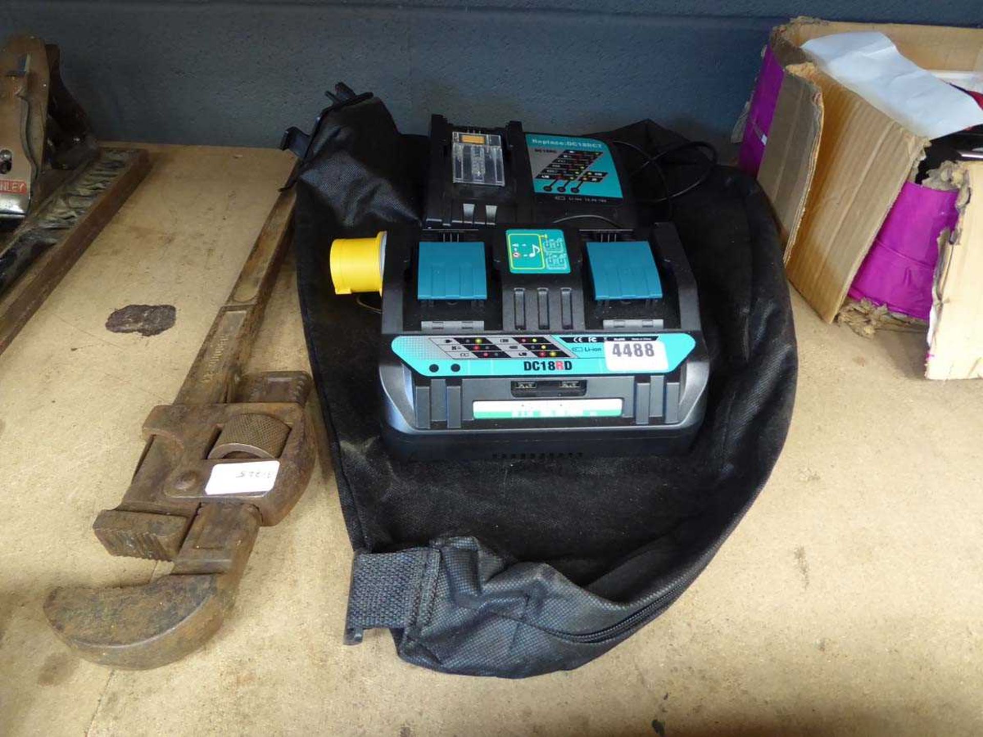 Pair of stilsons and a 110v and 240v drill battery chargers plus blower bag