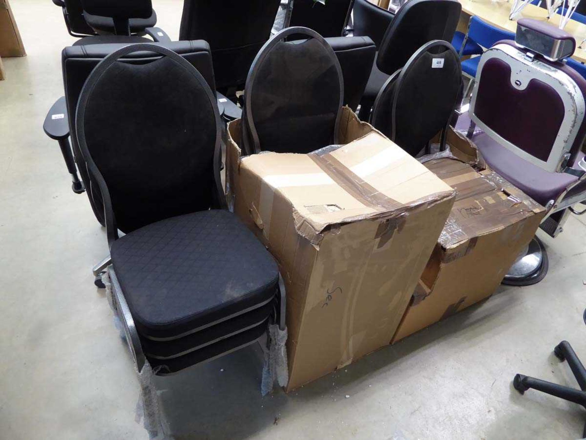 +VAT 8 stacking black cloth chairs