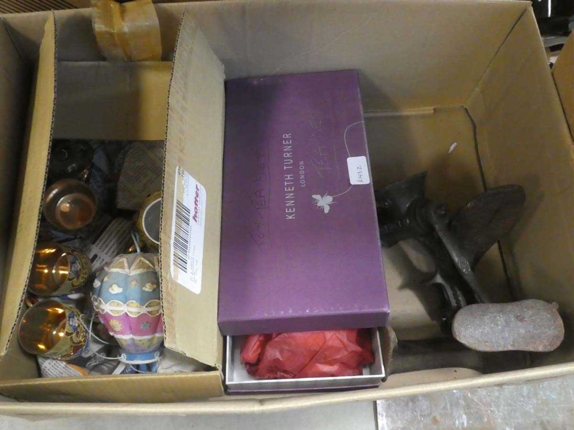 Box containing Japanese export crockery, cobblers last, mincing machine and a miniature toy tea set