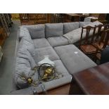 +VAT Grey fabric corner suite in two sections plus a footstool