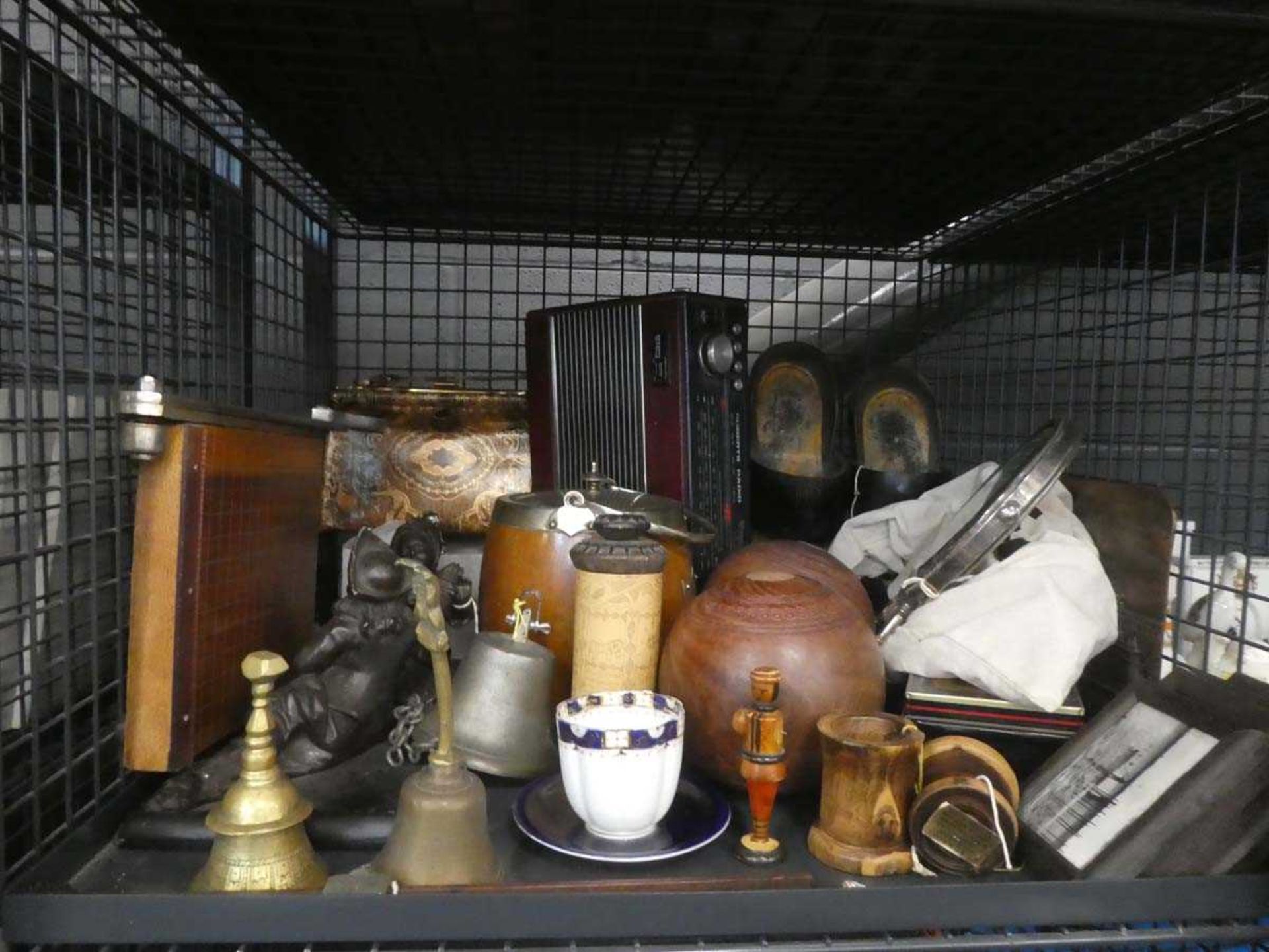 Cage containing bowling balls, ornamental clogs, vintage radio, brass ware, prints and ornamental