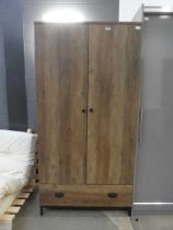 Pine effect double wardrobe with drawer under